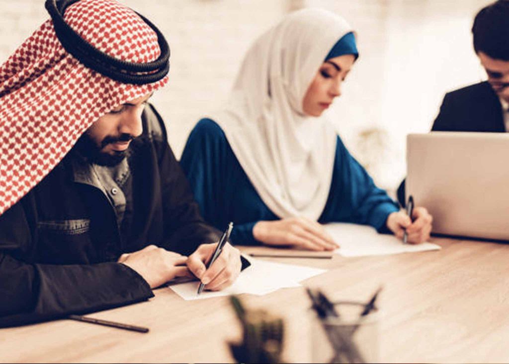 Arabic People Signing Documents